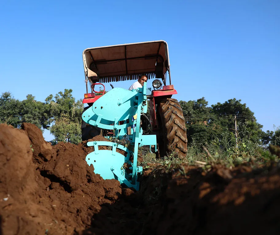 reversible disc plough in farm